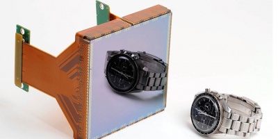 Comparison of a single 10.5k x 10.5k pixel sensor chip with a wristwatch. <i>Credit: STA</i>
